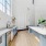 a kitchen with white cabinets