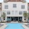 a pool in front of a building