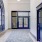 a hallway with blue doors